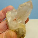 Quartz with rutile
Van Rhynsdorp, Western Cape South Africa.
84 x 61 x 41 mm
This specimen is a very sad story!  It had a good number of Rutile needles exposed and I dropped a pencil on it, damaging it badly. (Author: Pierre Joubert)