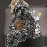 Bournonite "cogwheel" with Quartz
Herodsfoot Mine, Lanreath, Liskeard, Cornwall, England, United Kingdom
Specimen size: 5.2 × 2.7 × 3.3 cm
Main crystal size: 2.5 × 1.7 cm
Top (Author: Jordi Fabre)