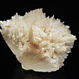 Powellite
Savada, Jalgaon Dist., Maharashtra, India
5.0 x 7.0 cm.
A yellowish, pseudo-octahedral powellite crystal on white scolecite. (Author: crosstimber)