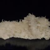 Quartz
Level 7, United Mine, Maratoto, New Zealand
13.5x7cm
A mound of crystals milky at the base and clear at the points on a bed of smaller crystals. (Author: Greg Lilly)