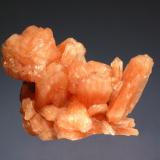 Stilbite
Nasik District, Maharashtra, India
4.5 x 6.5 cm.
Cluster of bright orange stilbite which displays the typical wheat-sheave arrangement. (Author: crosstimber)