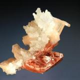 Heulandite
Jalgaon District, Maharashtra, India
3.9 x 5.7 cm.
Reddish heulandite crystals and pale salmon colored stilbite on drusy colorless chalcedony. (Author: crosstimber)