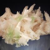 Scolecite
Rahuri, Ahmednagar District, Maharashtra, India
9.0 x 13.0 cm.
A jackstraw arrangement of pale pink scolecite crystals with light green crystals of apophyllite-(KF). This specimen was collected during a well dig in 2004, and according to the dealer there was only one pocket that contained these pink scolecites. (Author: crosstimber)