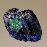 Azurite
Kerrouchene, Khenifra Province, Meknes-Tafilalet Region, Morocco
2.6 x 3.7 cm.
A single, dark blue azurite crystal with a small zone of malachite alteration. (Author: crosstimber)