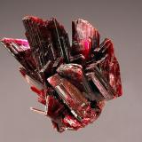 Erythrite
Vein 7, Bou Azzer, Tazenakht. Ouarzazate Province, Morocco
2.2 x 2.6 cm.
Undamaged dark magenta, bladed erythrite crystals. Collected in 2000. (Author: crosstimber)