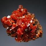 Vanadinite
Mibladen, Khénifra Province, Meknes-Tafilalet Region, Morocco
5.2 x 5.9 cm.
Lustrous red-orange hexagonal prisms to 1.0 cm on brown matrix. (Author: crosstimber)