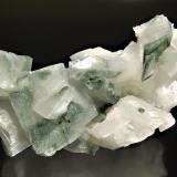 Adularia
Chhurka, Shigar Valley, Skardu District, Gilgit-Baltistan, Pakistan
7.2 x 11.0 cm.
Colorless crystals of adularia partially included with chlorite. Collected in 2003. (Author: crosstimber)