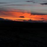 Sunset to the West side of Blesberg, the red clouds indicating welcome rain which did come the next day. (Author: Pierre Joubert)