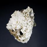 Anatase
Ras Koh Mountains, Kharan District, Balochistan, Pakistan
3.5 x 4.0 cm.
Sharp anatase crystals on a matrix of albite and quartz. (Author: crosstimber)