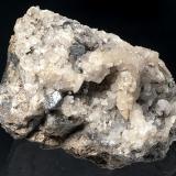 Acanthite
Monte Narba, Sardinia, Italy
8x6x6 cm
Two big, up to 1 cm Acanthite crystals with many smallers in Calcite and Quartz, from an old classic italian locale. (Author: Simone Citon)