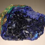 Azurite
Tongshan Mine, Guichi Dist., Anhui Province, China
5.3 x 8.5 cm.
Dark blue platy crystals to 1 cm lining a shallow cavity in massive azurite with minor malachite. (Author: crosstimber)