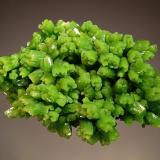 Pyromorphite
Daoping Mine, Gongcheng Co., Guilin Pref., Guangxi Zhuang AR, China
4.2 x 6.7 cm.
Apple-green, hexagonal prisms with hoppered terminations. (Author: crosstimber)