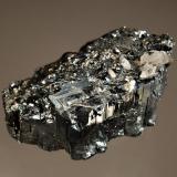 Bournonite
Yaogangxian Mine, Yizhang Co., Chenzhou Pref., Hunan Prov., China
4.0 x 5.2 cm
A single floater of bright metallic bournonite with minor quartz. (Author: crosstimber)