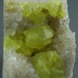 Sulfur with Calcite
Boling Dome, Newgulf, Wharton Co., Texas, USA
4.0cm x 5.0cm (Author: rweaver)