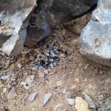 The contents of a small pocket with up to cm. size quartz and anthraxolite bits disgorged onto the bench. (Author: vic rzonca)