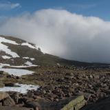 The next morning I walked back to base where I’d left my car at the Cairngorm Ski Centre. The fog came back with a vengeance and the wind blew strong, but I spied out the route before the view was obscured and used a map and compass. After about an hour I came across a large familiar footpath which led me safely off the mountain. I decided to return when there was less snow, which I did six weeks later for one superb day in July. (Author: Mike Wood)