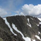 Summit of Braeriach (1296m) in top of huge south-facing cliffs, all granite. I spent a while searching with binoculars but failed to spot any pegmatite veins. Fortunately. (Author: Mike Wood)