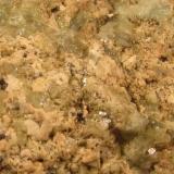 Beryl + Feldspar (rock)
Ben a’ Bhuird, Cairngorm Mountains, Grampian Region, Scotland, UK
FOV approx 3cm x 2cm
Close-up of above specimen. I think the little black specks are actually smoky quartz. (Author: Mike Wood)