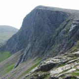 Carn Etchachan (1120m) and Shelter Stone Crag, at the head of Loch Avon in the Cairngorms. The cliff is about 800 feet high (~250m) and is popular for hard climbers, both in summer and in winter. (Author: Mike Wood)