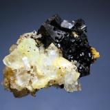 Babingtonite
Qiaojia Co, Zhaotong Pref., Yunnan Prov., China
4.8 x 5.9 cm
Tabular black babingtonite crystals associated with pale green prehnite and colorless quartz crystals (Author: crosstimber)
