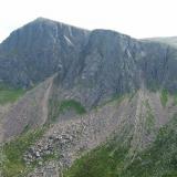 View of Carn Etchachan (1120m) and Shelter Stone Crag (just right of the highest point, between the two large scree fans) from the North, where the ’crystal cave ’ is - more of this later. Photo taken July 2006. (Author: Mike Wood)