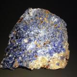 Sodalite
Princess Quarry, Dungannon Township, Hastings Co., Ontario, Canada
7.0 x 7.8 cm
Massive blue sodalite associated with yellow cancrinite and small grains of black biotite. (Author: crosstimber)