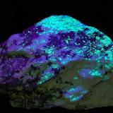 Uraninite
Ruggles Mine, Grafton, Grafton Co., New Hampshire, USA
5.0 x 7.5 cm
Same specimen as above under SW UV light. (Author: crosstimber)