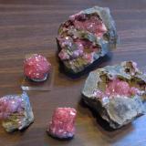 Rhodochrosite
Main Silicate Orebody, Potosi Mine, Santa Eulalia, Chihuahua, Mexico
thumbnails to small cabinet
Piece in top center has at least 9 micro natanites nestled among the rhodos (Author: Peter Megaw)