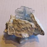 Barite
Milpillas Mine, Cuitaca, Santa Cruz, Sonora Mexico
10 b 7 cm.  barite is 5 cm
Pale blue barite on clay coated breccia matrix

Peter Megaw specimen and photograph...  Thanks Jesus! (Author: Peter Megaw)