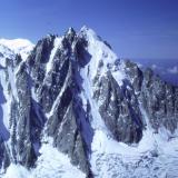 L&rsquo;Aiguille Verte (4122m) north face, seen across Glacier D&rsquo; Argentière from the summit of Le Aiguille D&rsquo; Argentière (3999m).
les Droites is to the left, even more impressive a sight.
Photo taken 1992. Scanned from slide. (Author: Mike Wood)