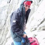 Photo of me at the same time, looking disgusted. We retreated, abseiling in some places, as the weather worsened. Good call as it turned out, it snowed all day above 2500m. (Author: Mike Wood)