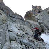 Scrambling up the steep gully which leads to the &rsquo;crystal cave&rsquo;. (Author: Mike Wood)