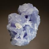 Prehnite
Merelani Mines, Lelatema Mts., Manyara Region, Tanzania
4.6 x 5.7 cm
An intergrown group of randomly oriented pale blue prehnite crystals. (Author: crosstimber)