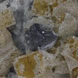 Fluorite, Galena, Quartz
Churprinz Friedrich August Erbstolln Mine , Großschirma, Freiberg District, Erzgebirge, Saxony, Germany

Galena Detail (Author: am mizunaka)