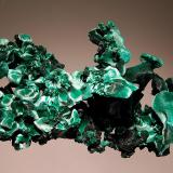 Malachite
Kiswishi Mine, Lubumbashi, Katanga Prov., DR Congo
4.5 x 7.0 cm
Velvety green chatoyant crystal sheaves. (Author: crosstimber)