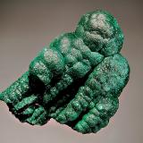 Malachite
Mashamba West Mine, Kolwezi, Katanga Prov., DR Congo
5.6 x 6.8 cm
Stalactitic forms coated with dark green malachite microcrystals. (Author: crosstimber)