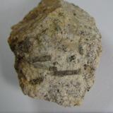 Prismatine
Granulite outcrop, Waldheim, Döbeln, Saxony, Germany
2’5 x 3’5 cm.
Long dark prismatine crystals in a classical granulite. (Author: prcantos)