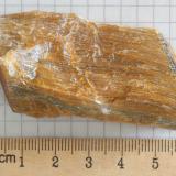 Riebeckite, Quartz and iron oxides-hydroxides (variety tiger&rsquo;s eye)
South Africa
7 x 2.8 x 5 cm (Author: James Jones)