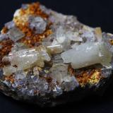 Cerussite on fluorite &amp; barite
White Rake, Tideswell, Derbyshire, England, UK
Crystals to 10 mm (Author: Andy Lawton)