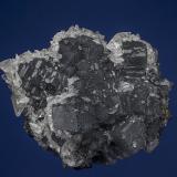 Fluorite, Calcite
San Martín Mine, San Martín, Mun. de Sombrerete, Zacatecas, Mexico
7.2 x 5.8 cm
Fluorite included with jamesonite. (Author: am mizunaka)