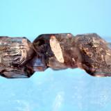 Quartz var amethyst var smoky
Goboboseb Mountains, Brandberg Area, Erongo Region, Namibia
5.8 x 1.7 cm
Double terminated amethyst and smoky quartz scepter (Author: Don Lum)