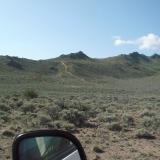 One of the steepest parts of the road in the distance.  Here is where we leave the valley floor. (Author: John S. White)