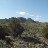 Just left the paved road and heading toward Petersen Mtn. in the distance. (Author: John S. White)
