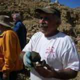 Paul Geffner holding likely the best specimen from Ronna’s pocket & a significant quartz from Petersen Mtn.  Undamaged and not repaired! (Author: Tony L. Potucek)