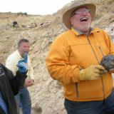 John Veevaert on the left is expressing his "disappointment" to mucho ebullient Nick Skirkanich upon Nick finding another fine quartz head.  Dan Kennedy is in the background, finding a lot of humor in the moment. (Author: Tony L. Potucek)