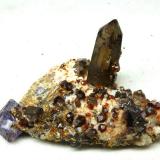 Spessartine with smoky Quartz, Fluorite
Yunxiao, Zhangzhou, Fujian, China
3.5×5×7 cm
 (Author: chinamineral)