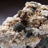 Sphalerite, Baryte.
Judkins Quarry, Nuneaton, Warwickshire, England, UK.
Sphalerite to 4 mm (Author: nurbo)