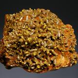 Pyromorphite
Les Farges Mine, Ussel, Corrèze, Limousin, France
5.6 x 7.0 cm
Olive-green, barrel-shaped pyromorphite crystals to 1.0 cm with mustard-yellow tips on iron stained white barite (Author: crosstimber)