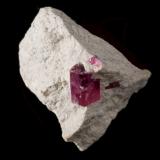 Beryl (var. bixbite)<br />Ruby Violet Claims, Wah Wah Mountains, Beaver County, Utah, USA<br />1.4 x 1.3 x 1.5 cm<br /> (Author: steven calamuci)