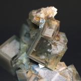 Fluorite
Huangshaping Mine, Guiyang Co., Chenzhou, Hunan Province, China
7.3 x 4.0 cm
Zoned cubes of green fluorite with sand inclusions (Author: Don Lum)